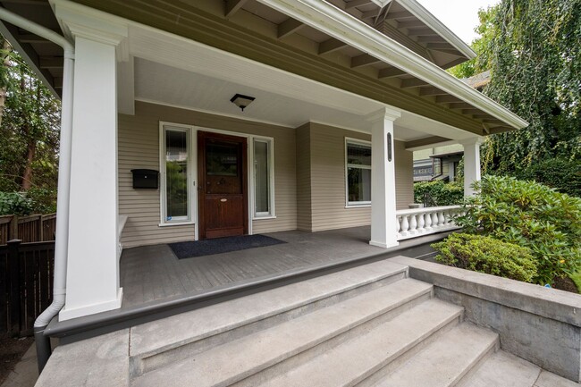 Building Photo - Traditional Four-Corner Craftsman Home on ...