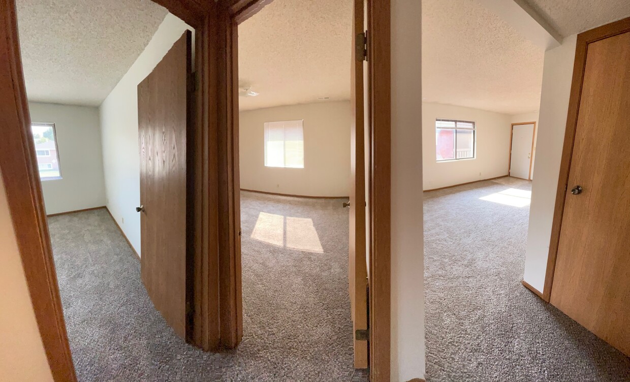 Hallway view of 2 bedrooms and the living room - 1617 Prospect St