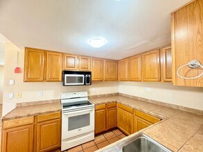 Building Photo - 5953 Carmelita Ave