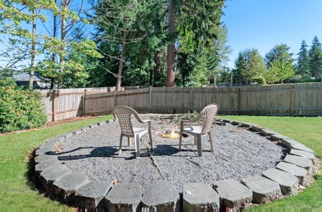 Backyard with Fire Pit - 6420 195th Ave E