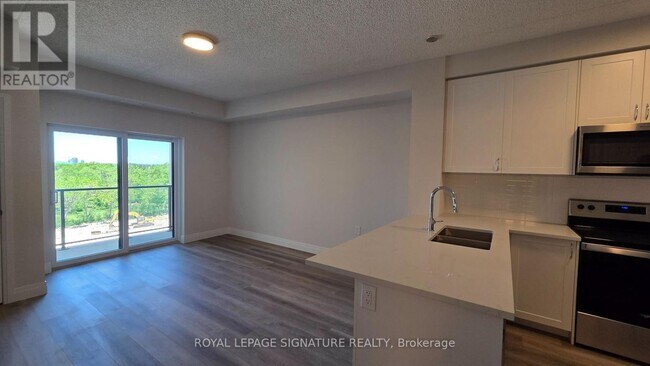 Photo du bâtiment - 6415 Regional Rd 25