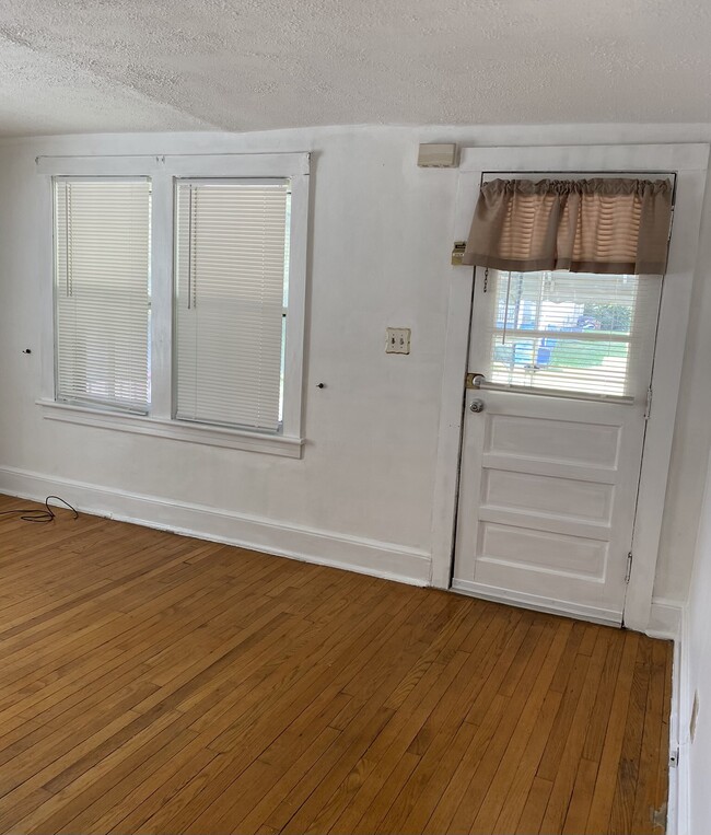 Front living room. - 825 Centre Ave NW