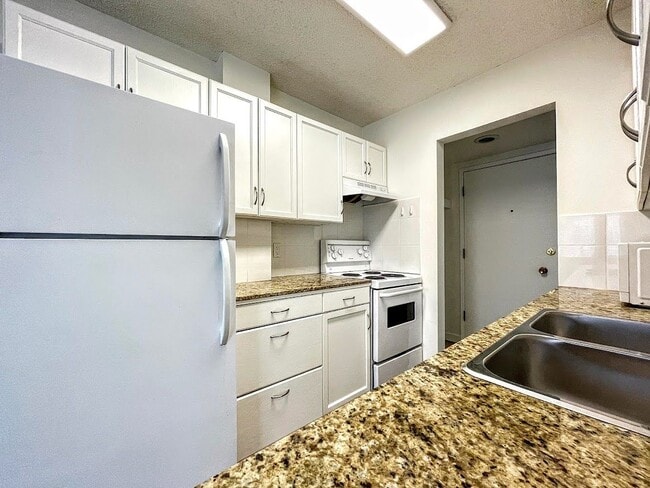 Building Photo - 604-601 1 Ave NW