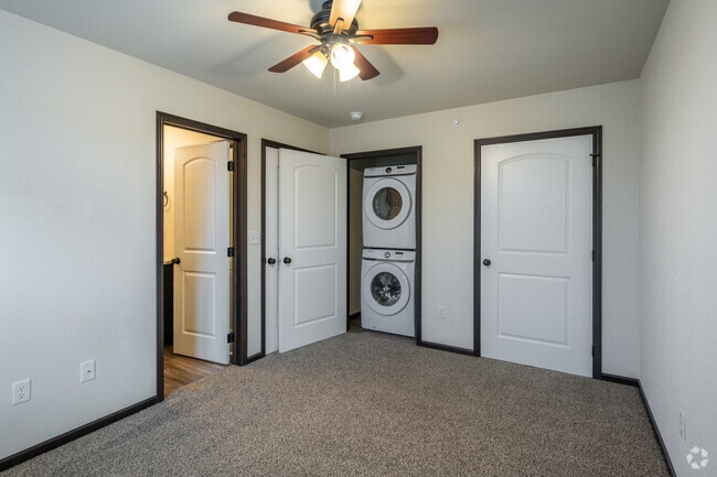 1BR, 1BA - 716SF - Bedroom and Laundry - Fox Run Apartments
