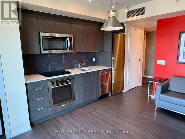 Photo du bâtiment - 105-2105 Champagne Ave S