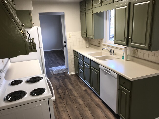 Kitchen, w/ window above sink - 6140 Dudley St