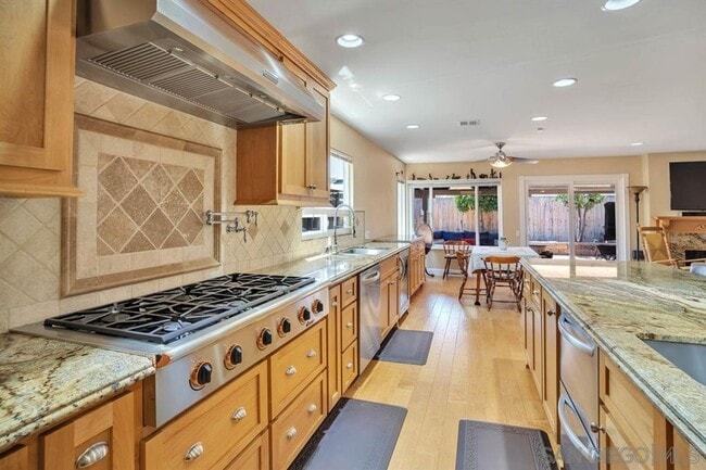 Building Photo - 4BR/2BA HOME w/ SOLAR & attached garage in...