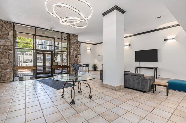 Building Photo - Affordable High Rise Condo in the heart of...