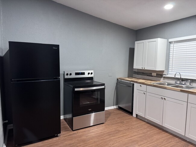 Newly renovated kitchen with new appliances - 510 Alice Fay Ave