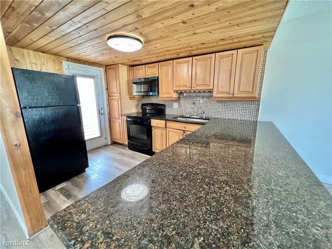 Building Photo - 3 br, 2 bath House - 2651 S Palm Aire Dr A...