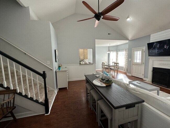 Living room looking into kitchen table - 801 Planters Trace Loop