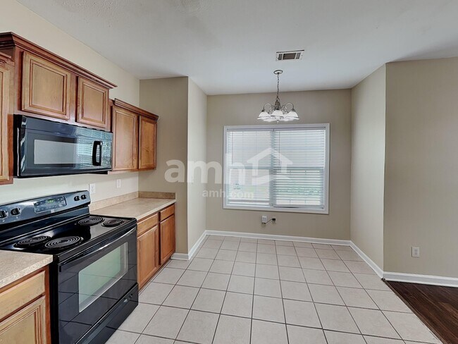 Foto del edificio - 6903 Grand Hickory Dr