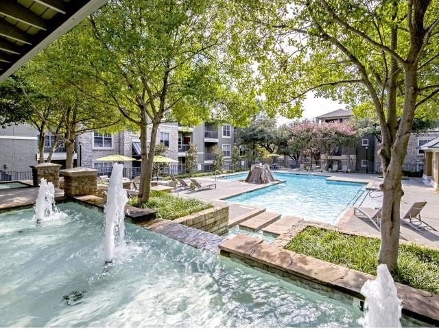 Resort Style Pool with water feature - The Pavilions