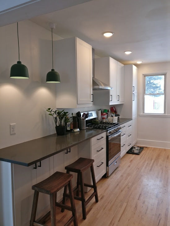 A nice little breakfast nook in the kitchen allows you to grab a seat while you're reading that recipe book, or for your guests to relax while you cook! - 2526 NE Taylor St