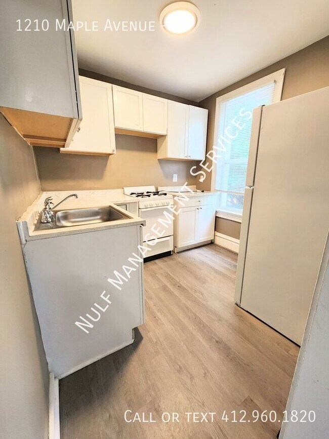 Foto del edificio - 1210 Maple Ave