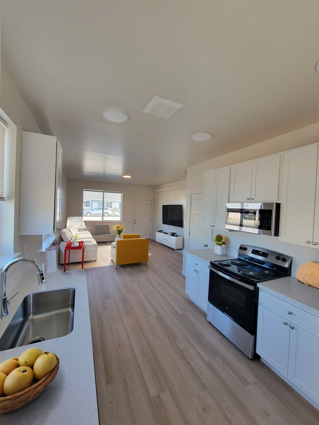 Vista de la cocina y la sala de estar - Twin Falls Harrison