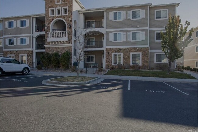 Front of building. Assigned parking spot is located in front of building, 2nd space in picture. - 1957 N Crest Rd