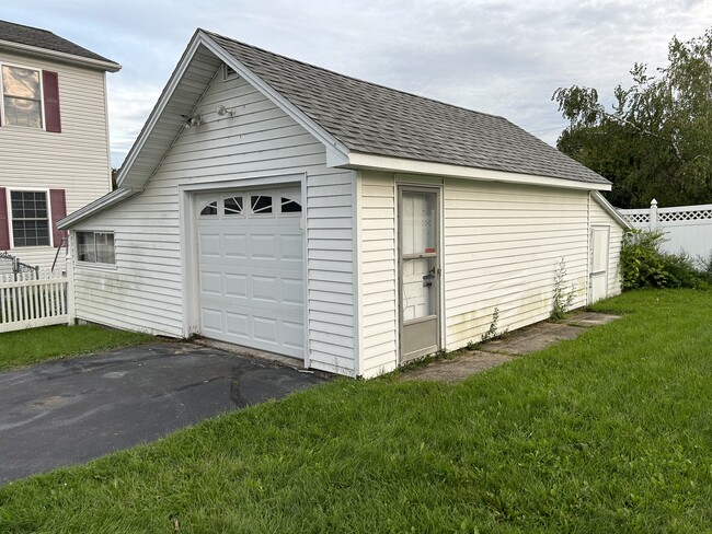 Single car garage with automated door and extra storage - 1330 Tracy Ave