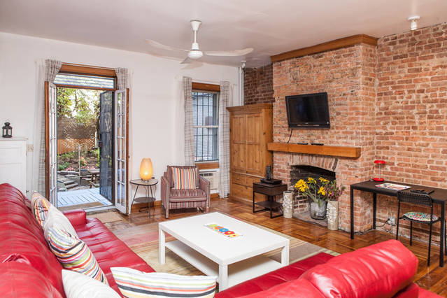 living room w/ doors to private garden - 270 E 7th St