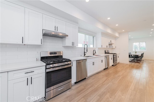 Foto del edificio - 1596 W 36th St