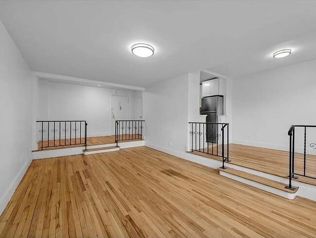 Photo - 411 E 26th St Apartment