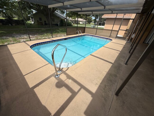 Building Photo - FiRST MONTHS RENT FREE 3/2/2 POOL HOME – 1...