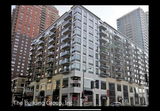 Building Photo - 1 E 8th St