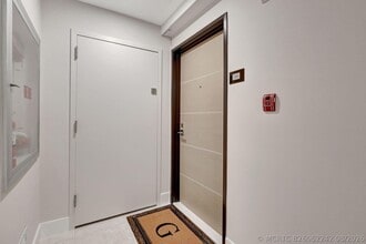 Building Photo - 5460 N Ocean Dr