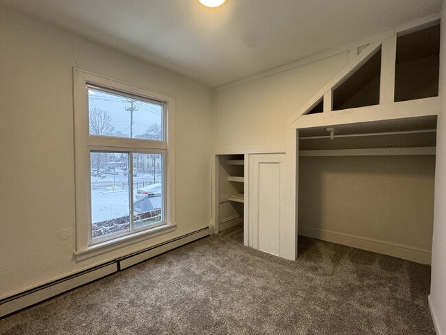 Building Photo - "Spacious 3-Bedroom Minneapolis Gem with Gleaming Hardwood Floors & 2 Full Baths!"