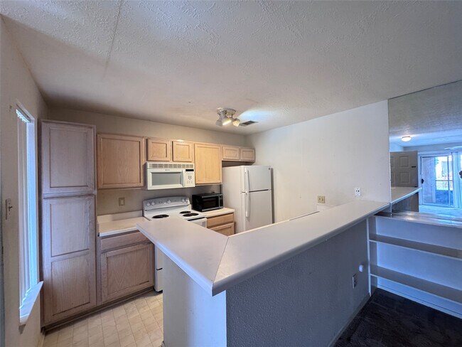Foto del edificio - 10555 Turtlewood Ct