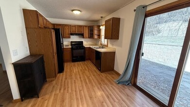 Building Photo - 8627-8635 Woodlawn Dr