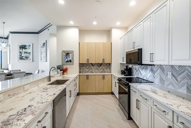 Foto del edificio - 5793 Cape Harbour Dr