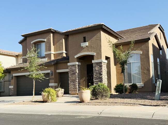 Spacious two-story home with a three-car tandem garage. - 1177 W Laredo Ave (Gilbert, AZ) House