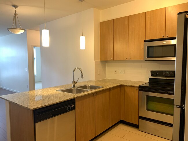 Photo du bâtiment - 213-2477 Kelly Avenue