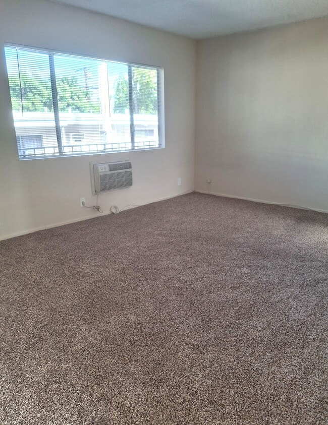 Building Photo - The Palms Apartments