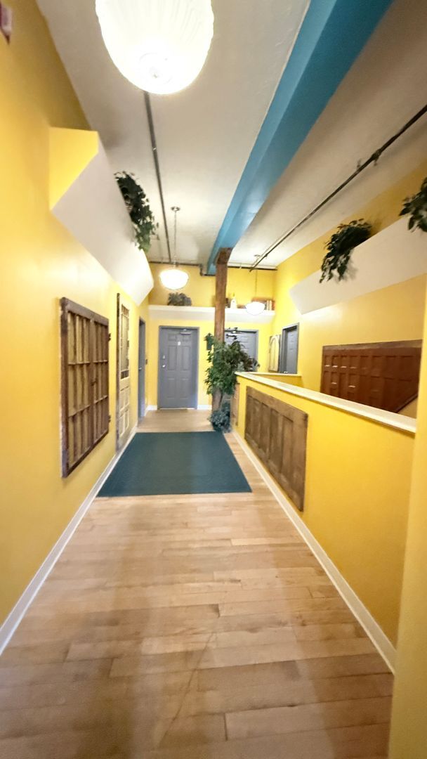 Building Photo - UPSCALE DOWNTOWN CONDO