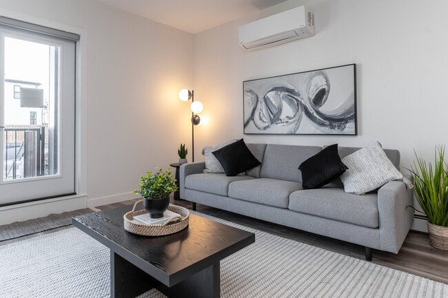 Building Photo - Vibe Apartments at Arbour Lake