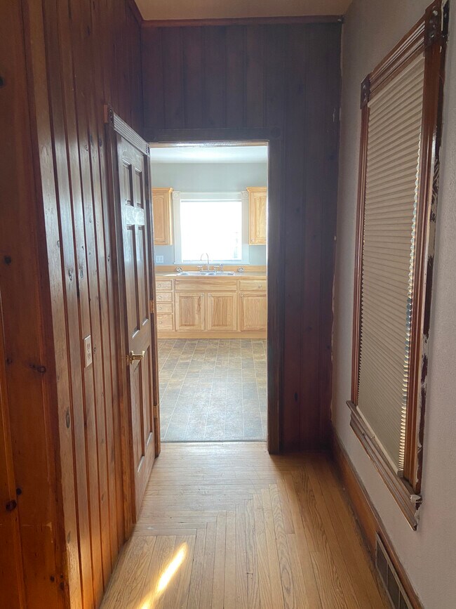 hallway to kitchen , bathroom on left in picture - 206 S Higbee St