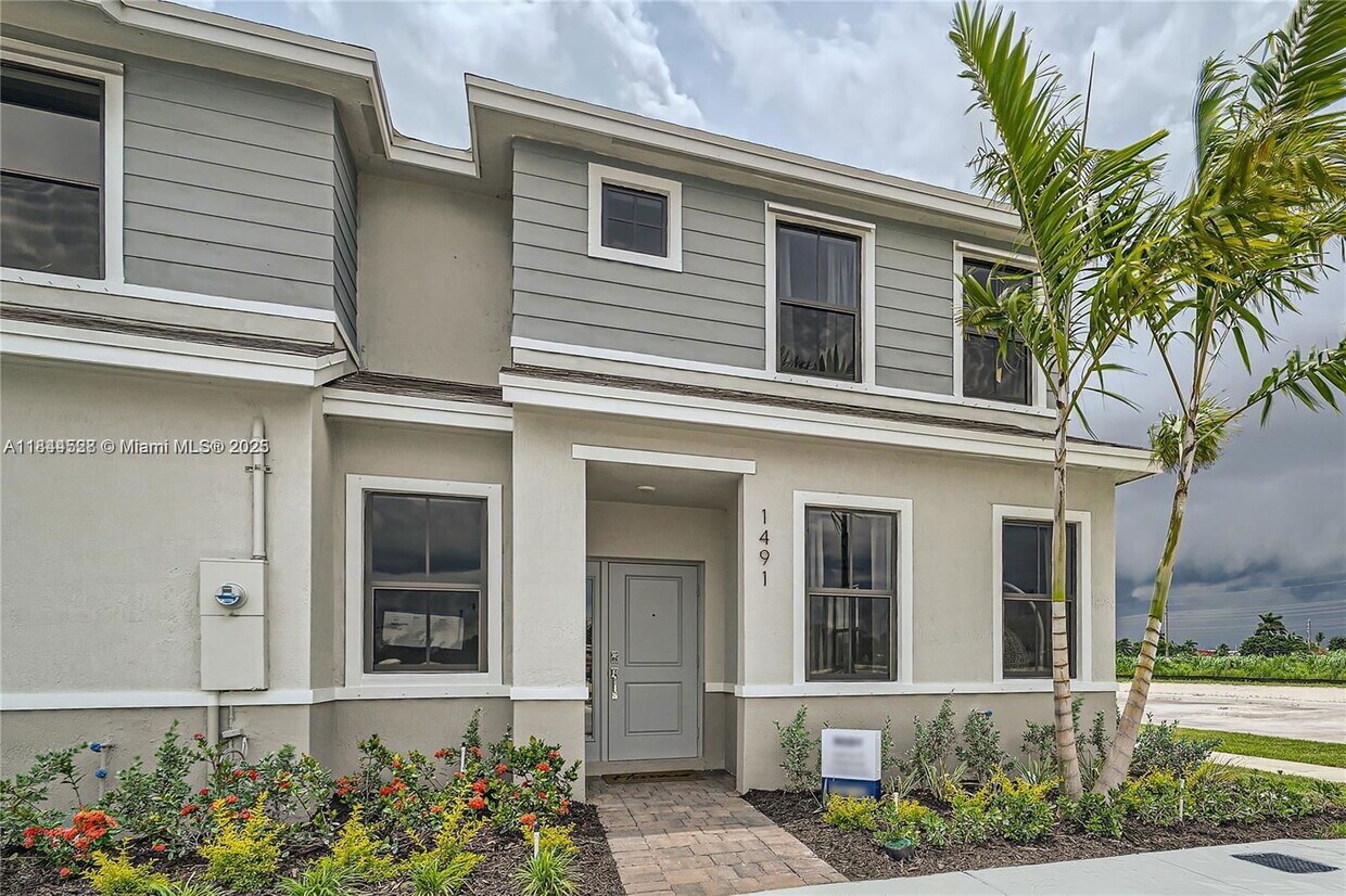 Photo - 409 Northeast 12th Street, Homestead, FL 33034 - 3 BR 2.5 BA townhouse