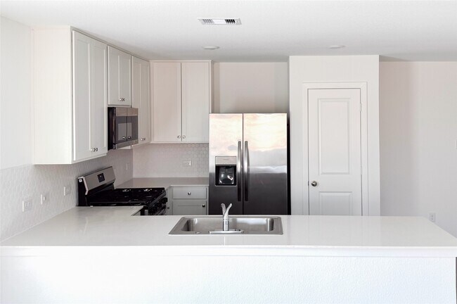 Foto del edificio - 6406 Begonia Trellis Dr