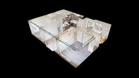 This 880-square-foot, single-floor apartment at 201 8th Avenue Northwest in Austin, MN features 2 bedrooms, 2 bathrooms, and 2 closets, delivering a clean, modern aesthetic throughout. The open-concept kitchen and living area serves as the heart of the home, showcasing rich dark-toned cabinetry, white quartz countertops, a subway tile backsplash, and a full suite of stainless steel appliances including a range, microwave, dishwasher, and refrigerator. A center island provides additional prep and gathering space, while light-toned hardwood flooring flows throughout the main living areas. The primary bedroom measures 160 square feet and features plush carpeting, a walk-in closet with built-in shelving, and an exposed industrial-style ductwork accent. The second bedroom also offers carpeted flooring and a large window with views of the surrounding community. Both bathrooms are finished with warm wood vanities, white quartz countertops, and matte black hardware. A sliding glass door in the living area opens to a private balcony with railing, allowing natural light to fill the space. Exposed ductwork throughout adds a contemporary industrial character to this well-appointed apartment.