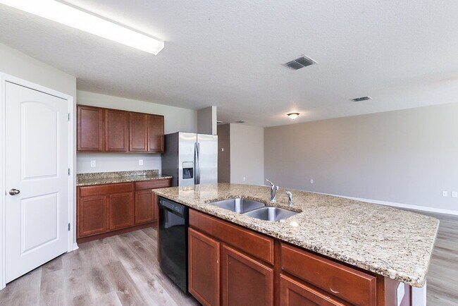 Building Photo - 11849 Valhalla Woods Dr