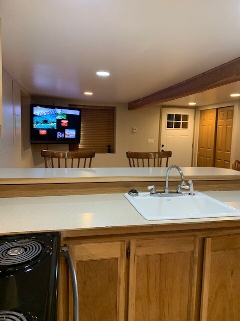 Kitchen looking on to the living room - 4916 S 124th St
