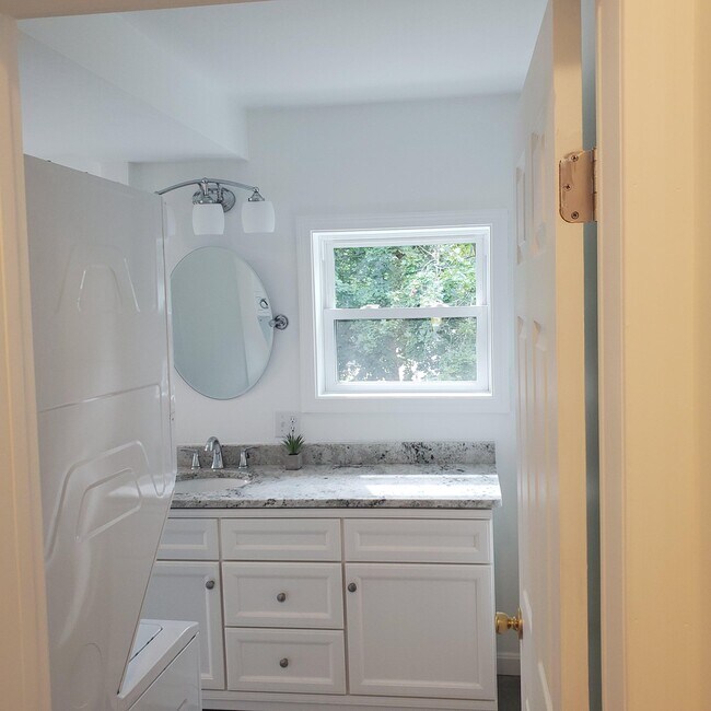 Bath with laundry - 55 S Leyden St