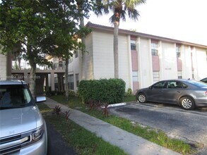 Building Photo - 10818 Royal Palm Blvd