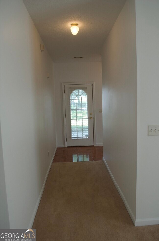 Foto del edificio - 65 Waters Edge Way