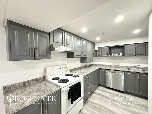 Photo du bâtiment - All-Inclusive 2-Bedroom Basement Apartment with Parking & Locker – Brampton