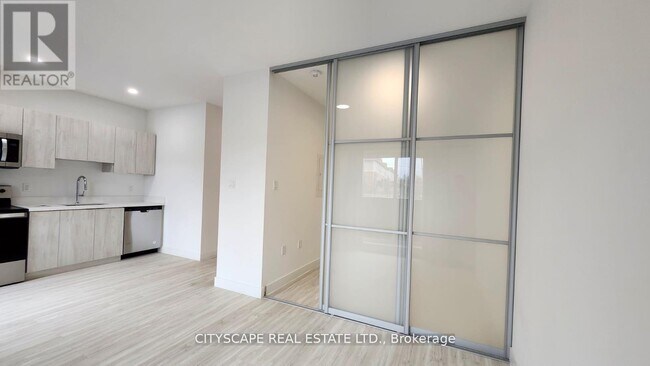 Photo du bâtiment - 408-408 Dundas St S