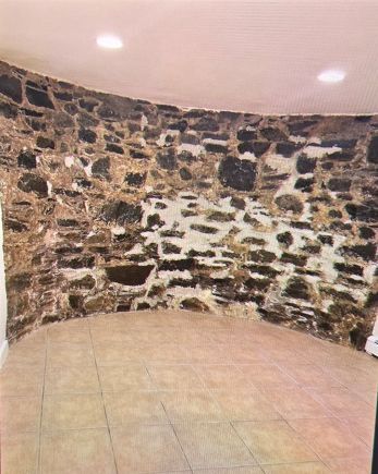 bedroom original exposed rock wall - 340 Harvard St