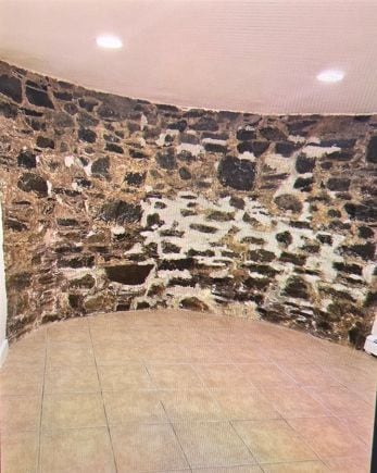 bedroom original exposed rock wall - 340 Harvard St